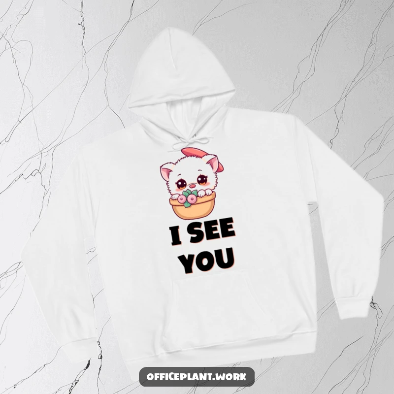 Funny cozy hoodie with a fuzzy creature peeking from behind a succulent, offering warm and humorous apparel for plant lovers.