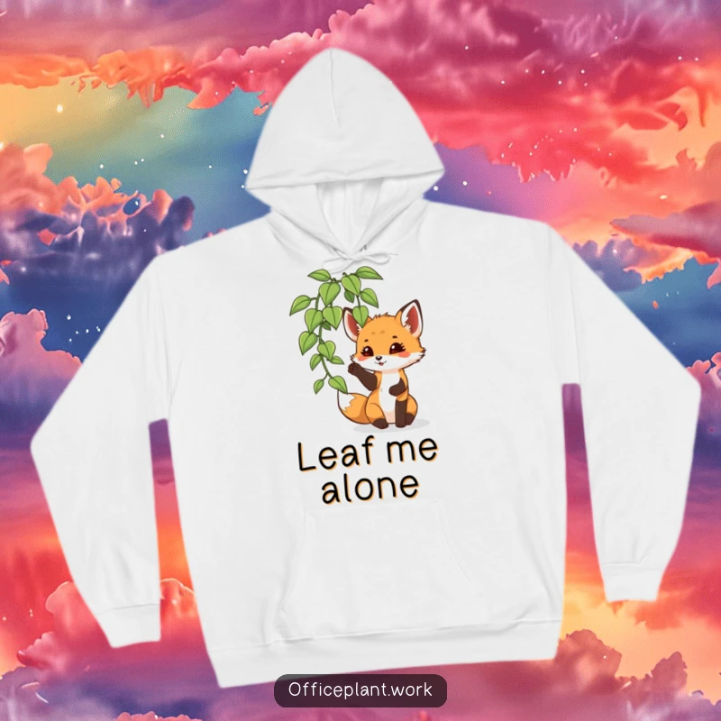 Funny fox cub hoodie, a playful creature batting at an office plant leaf, offering warmth and jungle-themed humor.