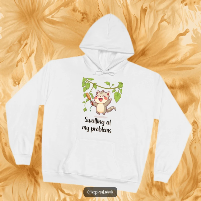 Funny hoodie depicting a happy, joyous creature playfully swatting at a dangling vine from a plant, designed for ultimate comfort and humor.