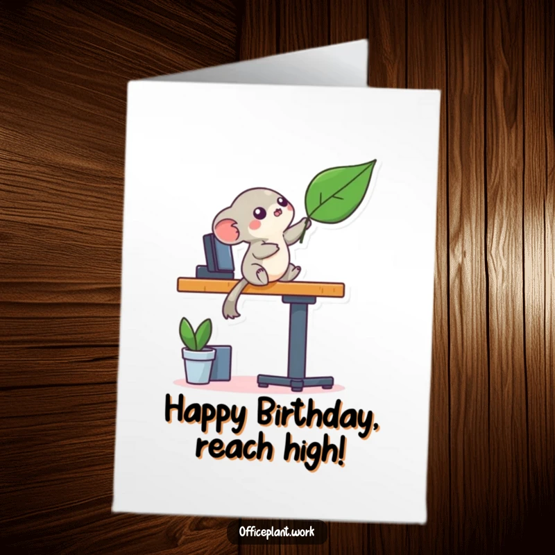 Funny Free Printable Creature Birthday Card, a playful creature balancing on a desk leg reaching for a leaf, ready to print.